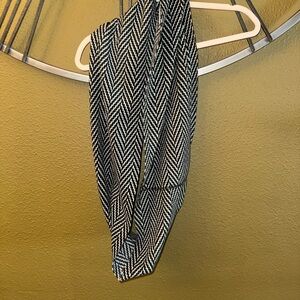 Stylish black and white infinity herringbone scarf.